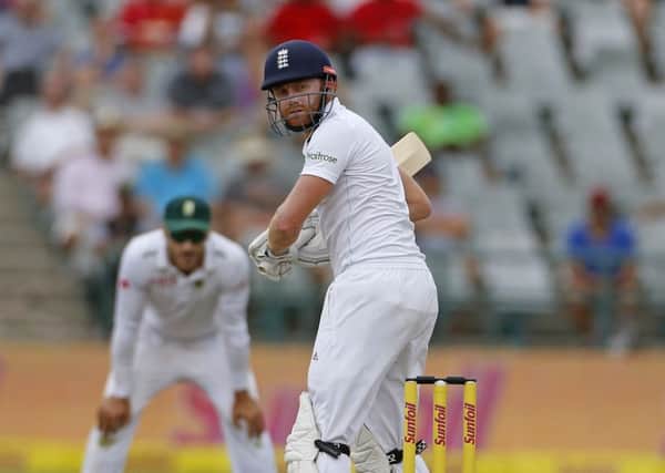 England's Jonny Bairstow  looks back after he played a shot during their second cricket Test match against South Africa in Cape Town.