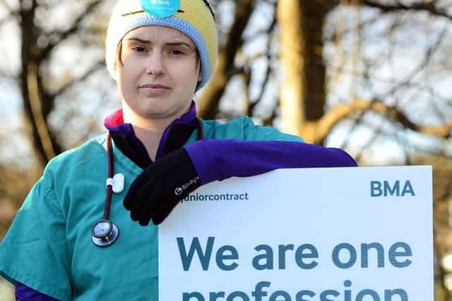 A&E doctor Elizabeth Morris on the picket line at the Northern General Hospital in Sheffield. Picture: Scott Merrylees