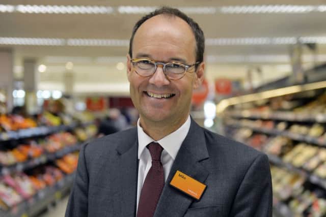 Leader: Mike Coupe became chief executive of Sainsbury's in July 2014.
