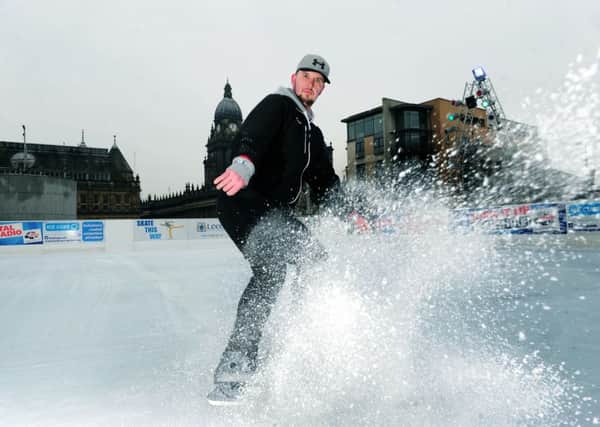 Bobby Streetly tests the ice at the Ice Cube in Millennium Square, Leeds. Pics: Jonathan Gawthorpe.