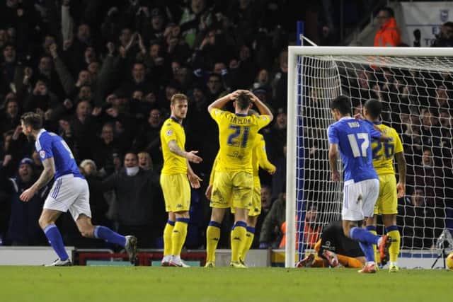 Leeds United defenders show their frustration after Luke Chambers equalised for Ipswich on Tuesday.