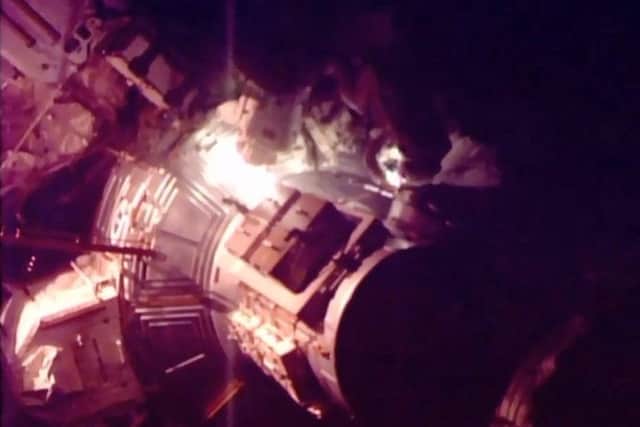 Tim Peake undertakes a spacewalk to help repair a broken power unit of the International Space Station