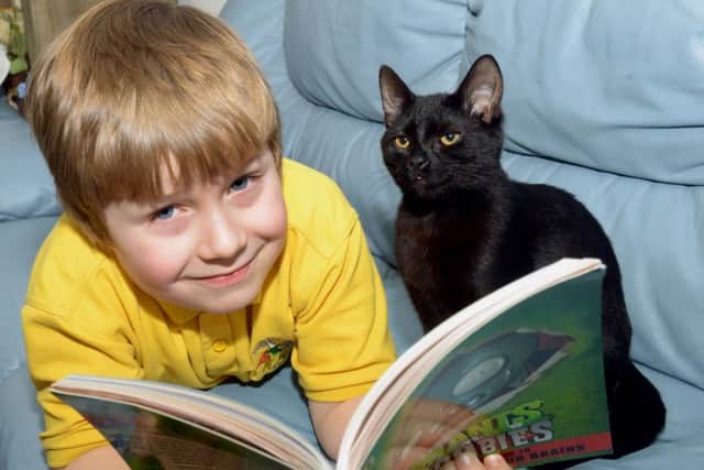 Harrison Walczyna and his kitten Protty at their home in Garforth, Leeds. Picture by Gary Longbottom.