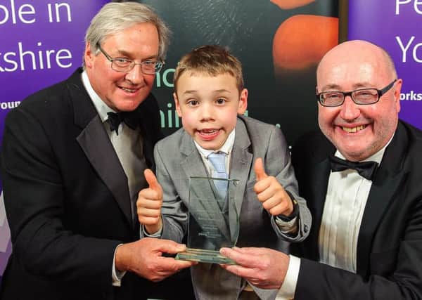 Personality of the Year Bailey Matthews receives his award at the 2015 ceremony.