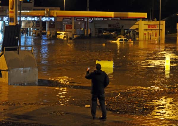 DECEMBER 2015: Flooding on Kirkstall Road. PIC: Tony Johnson