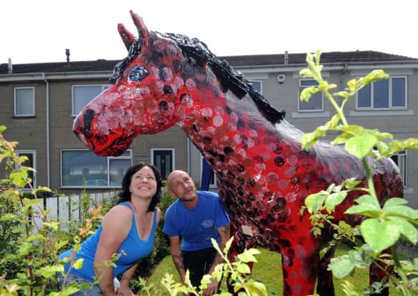 Horsforth residents Dean Taylor and Izaskun Arrieta pictured with the horse they created for the 2015 Horsforth Walk of Art