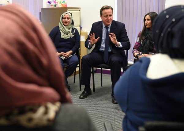 David Cameron's insistence on learning English should apply to all, not just Muslim women. Photo: Oli Scarff/PA Wire
