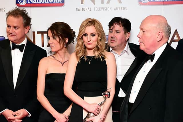 Laura Carmichael (centre) from Downton Abbey with the award for Best Drama in the pressroom at the National Television Awards 2016 held at The O2 Arena in London. PIC: PA