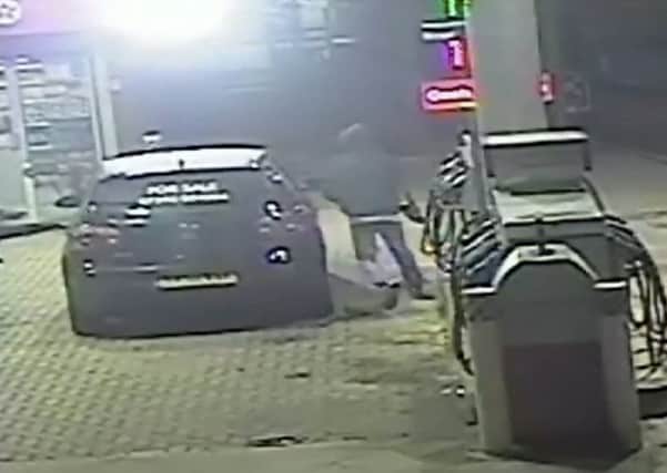 CCTV still of a man having his car stolen from a petrol station forecourt by an opportunistic thief on Christmas Day.  See NTI story NTIPETROL.  The 51-year-old man was on the forecourt at Texaco petrol station, Stratford Road in Sparkbrook when he was approached by a man asking for a lift at approximately 6.40am.  When he refused, the man punched him several times and in the midst of the scuffle, successfully managed to pinch his car keys and made a dash for the vehicle- a Black VW Golf.  The car owner tried to get in the passenger side and was briefly dragged along before the suspect sped off.  He suffered minor injuries and was taken to hospital for treatment and was later discharged.