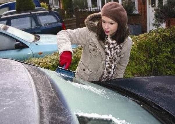 Watch out for thieves while de-icing the car.