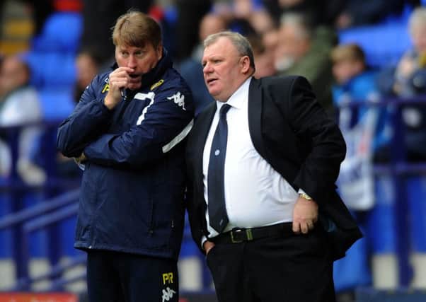 Leeds 
United's head coach Steve Evans with his assistant Paul Raynor.