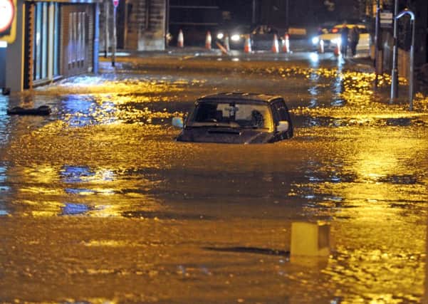 DECEMBER 2015: Cars under floodwater in Kirkstall, PIC: Tony Johnson