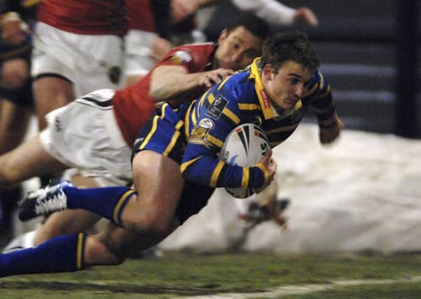 Lee Smith goes over to score his second try against Celtic Crusaders in 2009.
