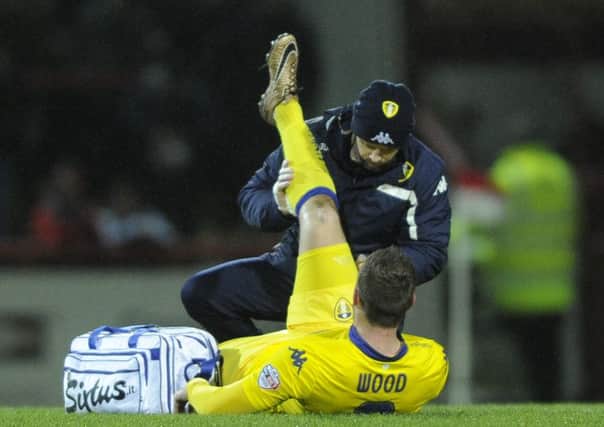 Chris Wood is treated for a hamstring injury.
 PIC: Bruce Rollinson