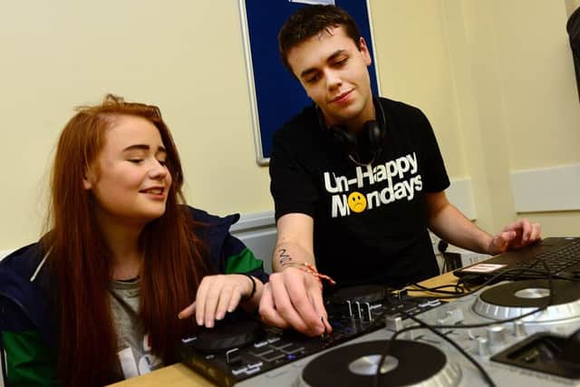 19 Jan 2015...... Anais Butterfield and Jack Scarrs mix the music at the launch of a new Autistic Spectrum youth group, called Fusion in Wakefield. Picture Scott Merrylees