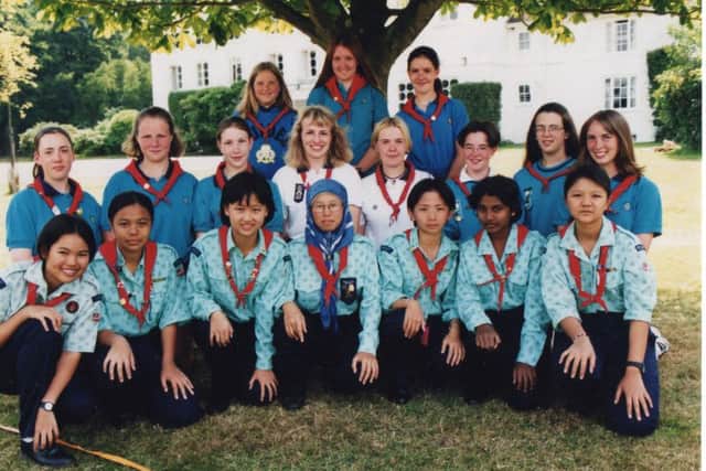Celebrating a century of city Girlguiding with the Senior Section. Pic is from 1999 World Camp, including Guides and Rangers from Malaysia, courtesy of Alison Hughes
