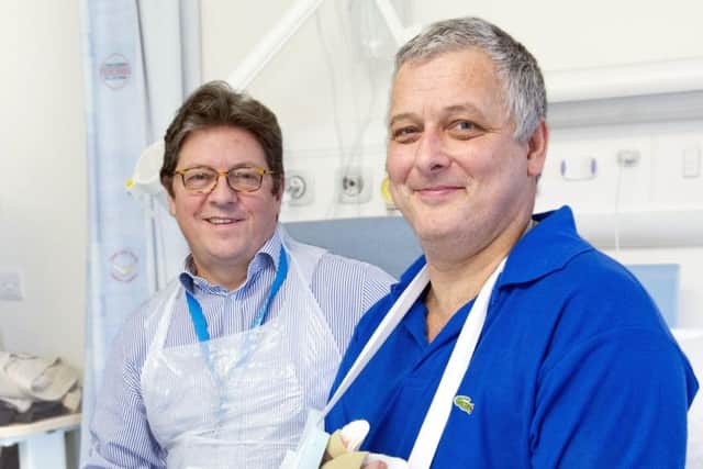 Professor Simon Kay who operated on Mark Cahill when he became the first person in the UK to have a hand transplant