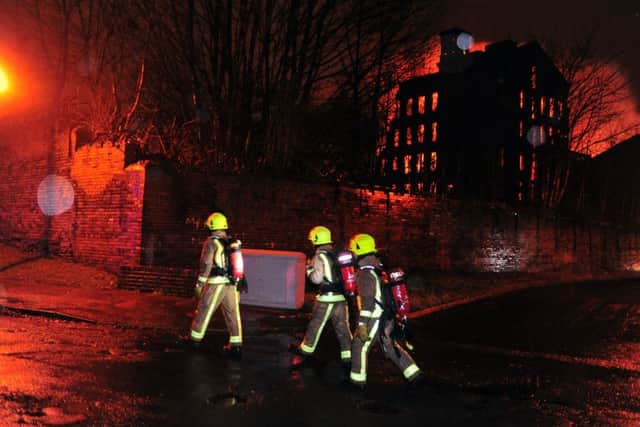 Firefighters deal with a huge blaze at a mill in Lumb Lane, Bradford . Picture by Tony Johnson.