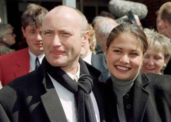 Phil Collins with Orianne Cevey in 1997. Picture: Justin Williams/PA Wire