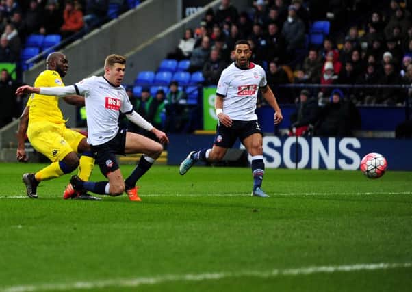 Souleymane Doukara gives Leeds the lead at Bolton.