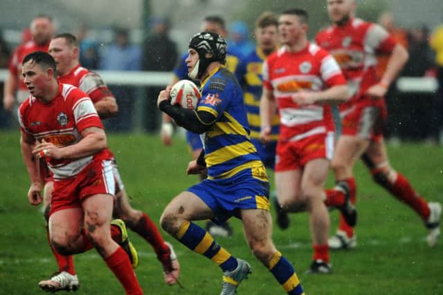 Action from East Leeds v Oulton.