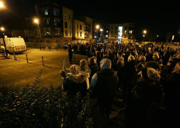Locals in Bywater Allerton hold a vigil for murder victims Geraldine Newman, 51, her son Shane Newman, 6 and her daughter Shannon Newman. Picture: Ross Parry Agency