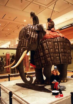 Conservation officer Alison Draper with the 'Elephant Armour' at the Royal Armouries Museum, Leeds. Its as taken two days to to mount the elephant armour centrepiece in the Oriental Gallery.