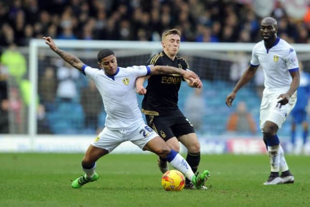 Liam Bridcutt tackles Nottingham Forest's Ben Osborn. PIC: Tony Johnson