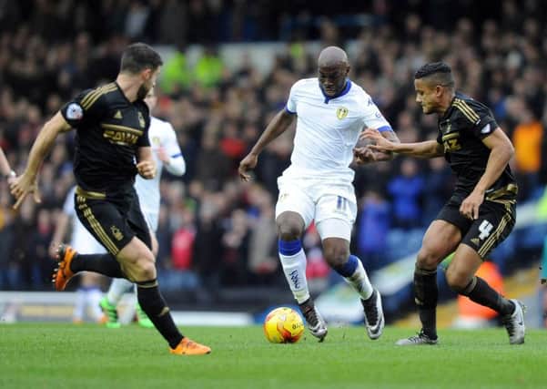 Souleymane Doukara tries to get past Nottingham Forest's Bokan Jokic. PIC: Tony Johnson