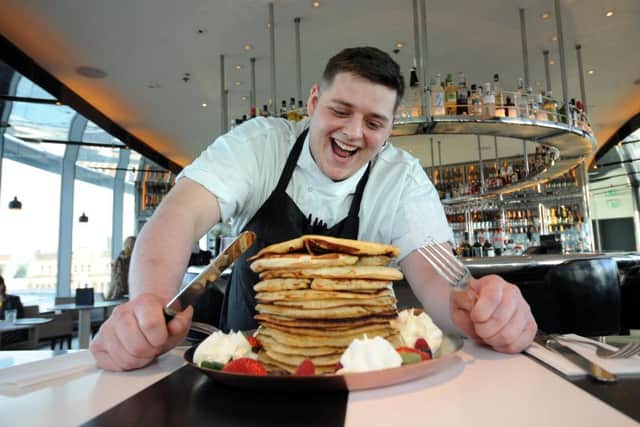 Junior sous chef Joe Carrol pictured with the pancake challenge at Angelica. Picture by Simon Hulme.