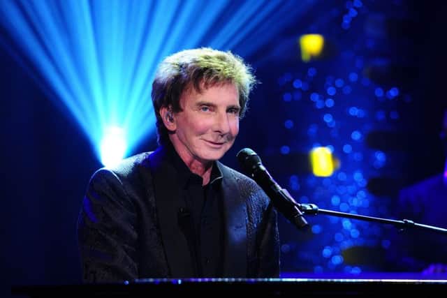 Barry Manilow who has been rushed to hospital due to complications from "emergency oral surgery" that he had on Monday.