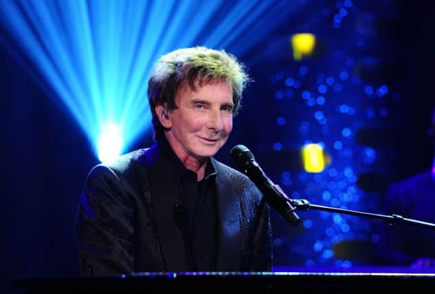 Barry Manilow who has been rushed to hospital due to complications from "emergency oral surgery" that he had on Monday.