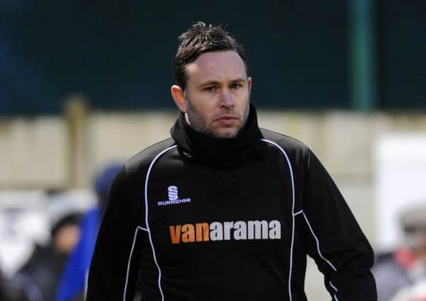 Guiseley's manager Mark Bower.
