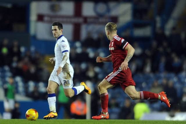 Lewis Cook gets ahead of Middlesbrough's Adam Clayton. PIC: James Hardisty