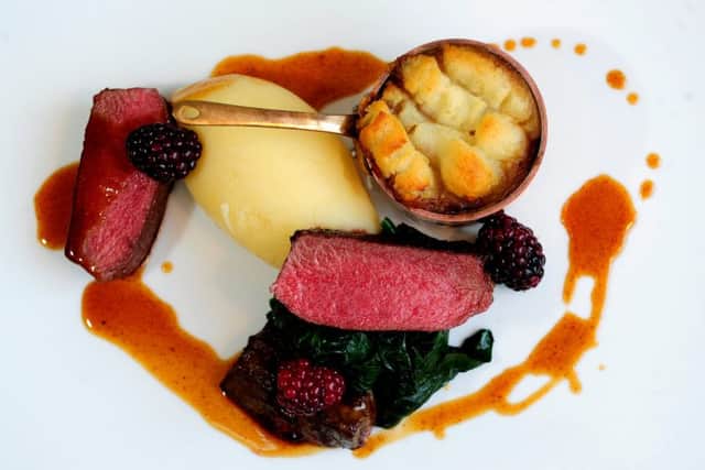 Pan fried venison loin, braised cottage pie, pink liver, artichoke puree and blackberry.
 PIC: Jonathan Gawthorpe