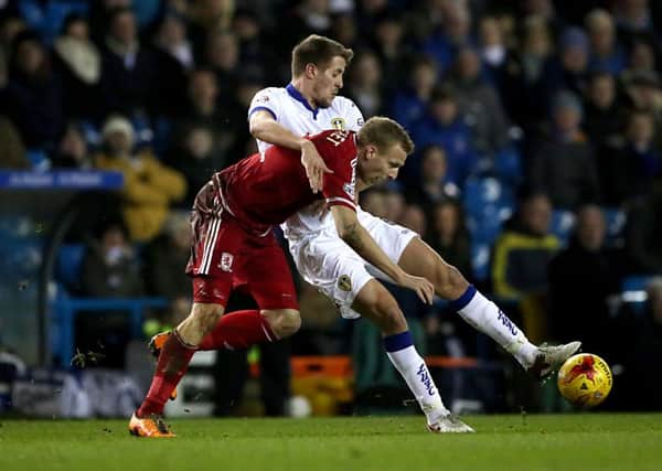 Scott Wootton battles for the ball with Middlesbrough's Ritchie De Laet. PIC: PA