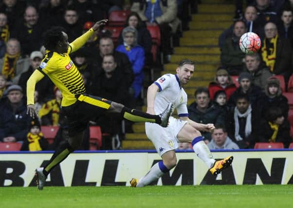 Charlie Taylor crosses the ball into the box past Watford's Juan Paredes
.