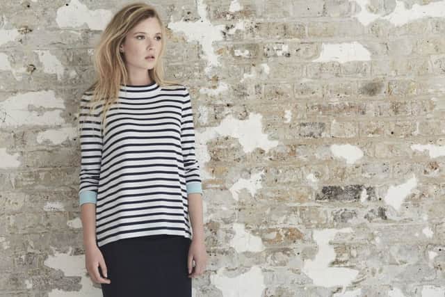 Ella casual Breton top in navy and white with ice blue cuffs, Â£109.

Needle Location