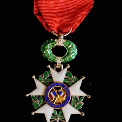 Close up: A LÃ©gion dHonneur medal.