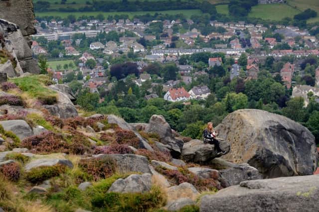 Views to a thrill: The Cow and Calf at Ilkley and, inset, the Mourne Mountains from Rocky Shore near Tyrella, Northern Ireland. The region is where parts of Game of Thrones were filmed.main Picture: simon hulme