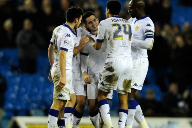 Lewis Cook and teammates celebrates his wonder goal. PIC: Bruce Rollinson