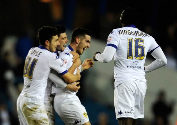 EYE FOR GOAL: Leeds United's Lewis Cook celebrates his stunning equaliser against Fulham. Picture by Bruce Rollinson.