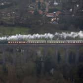 An aerial view of the Flying Scotsman going over the Digswell Viaduct near Welwyn Garden City on its inaugural run from London to York after a decade long, Â£4.2 million refit. (Picture: Steve Parsons/PA Wire)