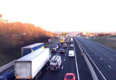 Motorway queues at the height of the rush hour this morning