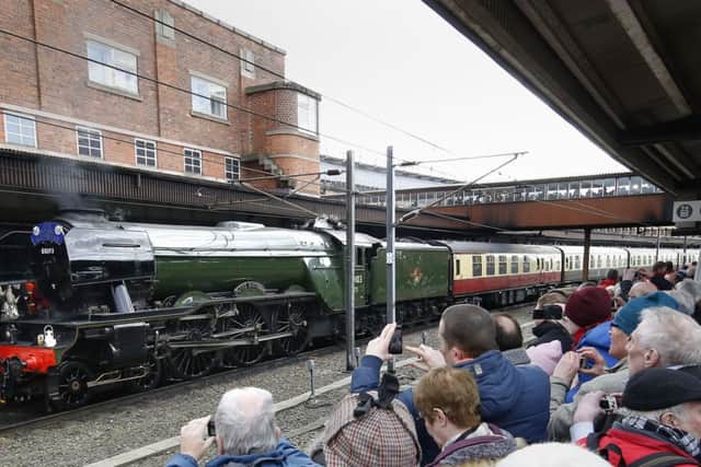 The Flying Scotsman arrives at York station after its inaugural run from London after a decade-long, £4.2 million refit.