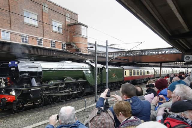The Flying Scotsman arrives at York station after its inaugural run from London after a decade-long, Â£4.2 million refit.