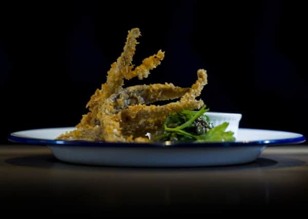 Crispy pigs ears with capers tartar sauce.