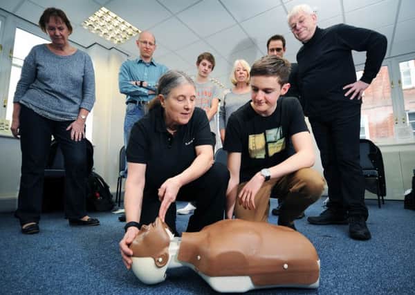 first aid: Volunteers take part in a YEP First Aid For All workshop with St John Ambulance trainer Janet Wilson.