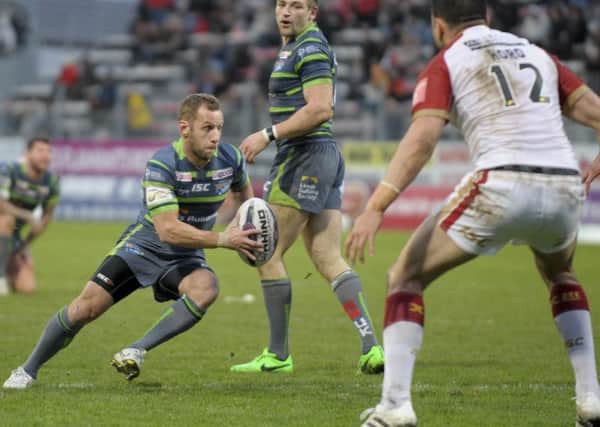 Rob Burrow in action against Catalans Dragons.