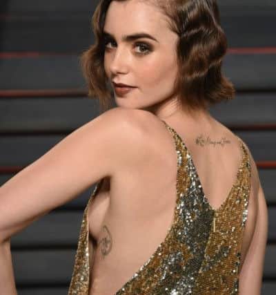 Lily Collins arrives at the Vanity Fair Oscar Party